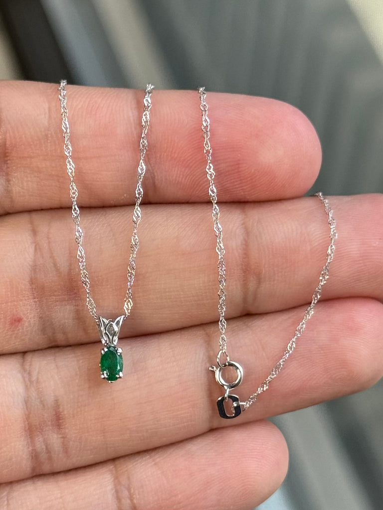 0.14-0.26 Cts of 5x3 mm AA Oval Natural Emerald Scroll Solitaire Pendant in Platinum