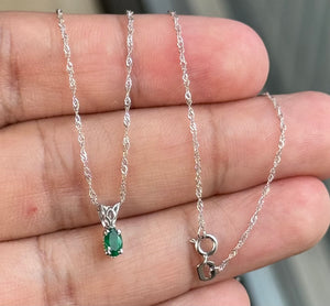 0.14-0.26 Cts of 5x3 mm AA Oval Natural Emerald Scroll Solitaire Pendant in Platinum