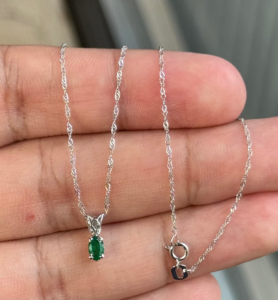 0.14-0.26 Cts of 5x3 mm AA Oval Natural Emerald Scroll Solitaire Pendant in Platinum