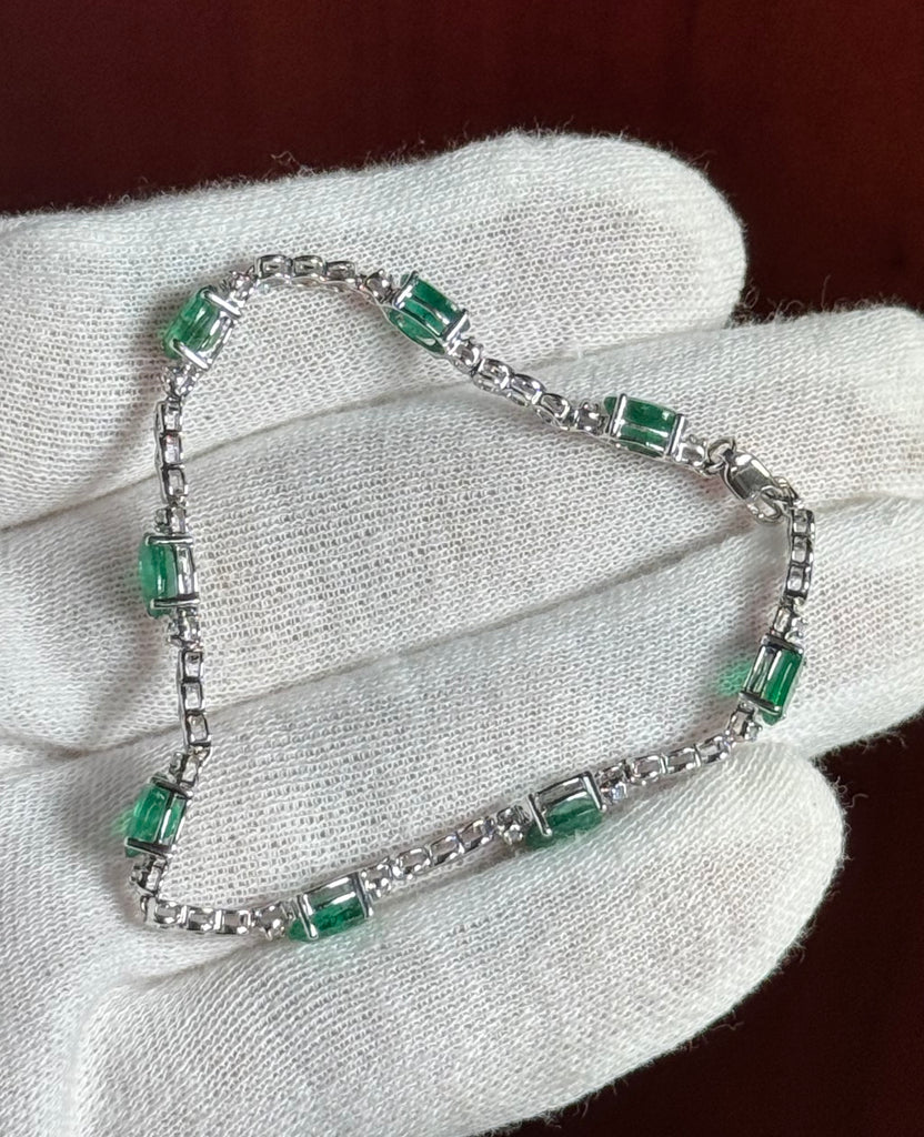 0.08 Ct Diamond and 5.85 Ct Natural Emerald Bracelet – 7x5 mm Oval Emerald & Diamond Tennis Bracelet in 14K White Gold