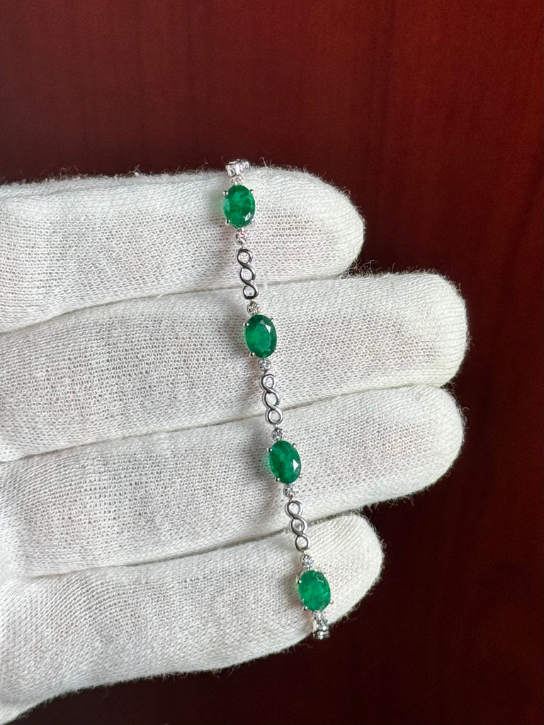 0.08 Ct Diamond and 5.85 Ct Natural Emerald Bracelet – 7x5 mm Oval Emerald & Diamond Tennis Bracelet in 14K White Gold