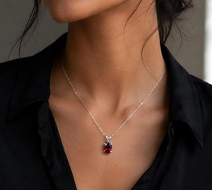 8x6mm Garnet Pendant | Platinum Oval Scroll Solitaire Necklace — January Birthstone Jewelry