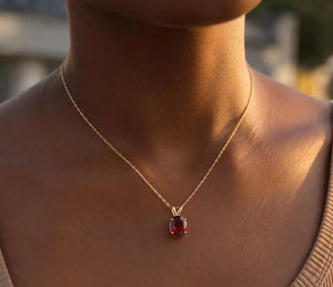 9x7mm Garnet Pendant | 14K Yellow Gold Oval Solitaire Necklace — January Birthstone Jewelry