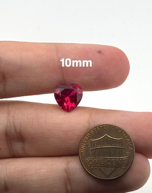 Lab Grown Ruby Heart #5 faceted red loose gemstone on white background
