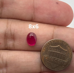 Lab Grown Ruby Oval Cabochon #5 polished red gemstone front view