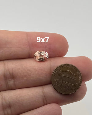 Synthetic sapphire oval 10x8mm peach orange gemstone high clarity