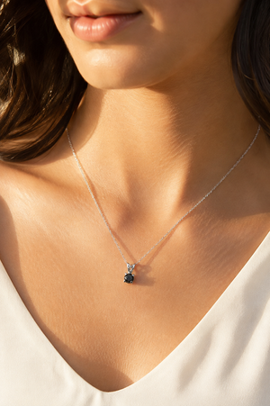 Black diamond pendant worn with an elegant outfit rose cut black diamond necklace 