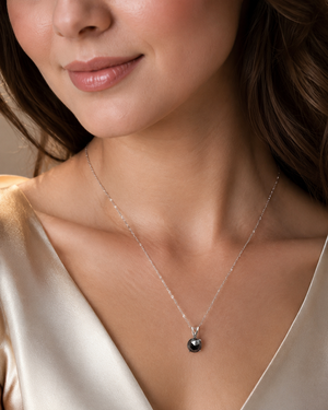 Black Diamond solitaire pendant with a 7.05–8.80 mm round rose-cut Black Diamond in Platinum