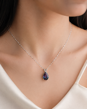 14K white gold alexandrite pendant worn as a pear cut alexandrite necklace 