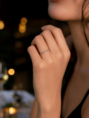 0.15 CT champagne diamond ring worn on a woman's finger for elegant everyday jewelry styling 