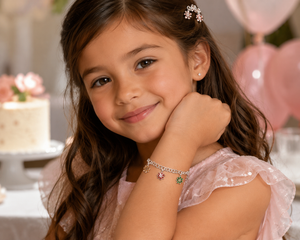 Young girl wearing floral diamond bracelet styled for birthday celebration jewelry