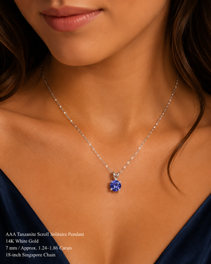 Woman wearing tanzanite pendant necklace styled for anniversary dinner elegant gemstone jewelry