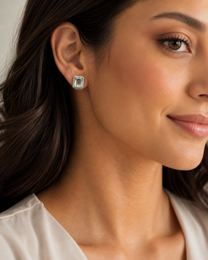 Woman wearing green amethyst studs styled for anniversary elegant jewelry look