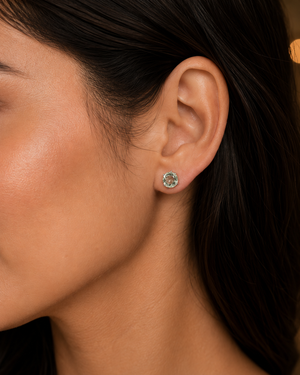 Woman wearing Green Amethyst stud earrings styled for anniversary dinner and evening elegance