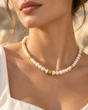 14K gold freshwater pearl necklace for women worn at the neckline as an elegant 18 inch pearl necklace 