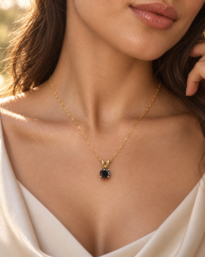 Black diamond pendant worn at the neckline as a black diamond necklace for women for anniversary styling 