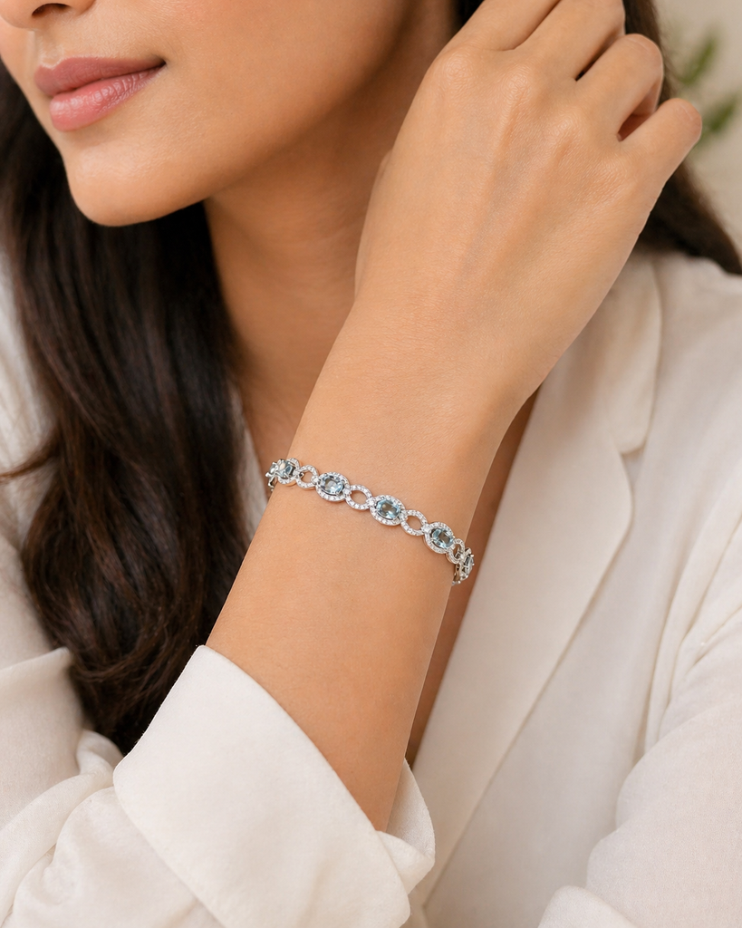 Bracelet worn on wrist showcasing elegant aquamarine jewelry for formal occasions