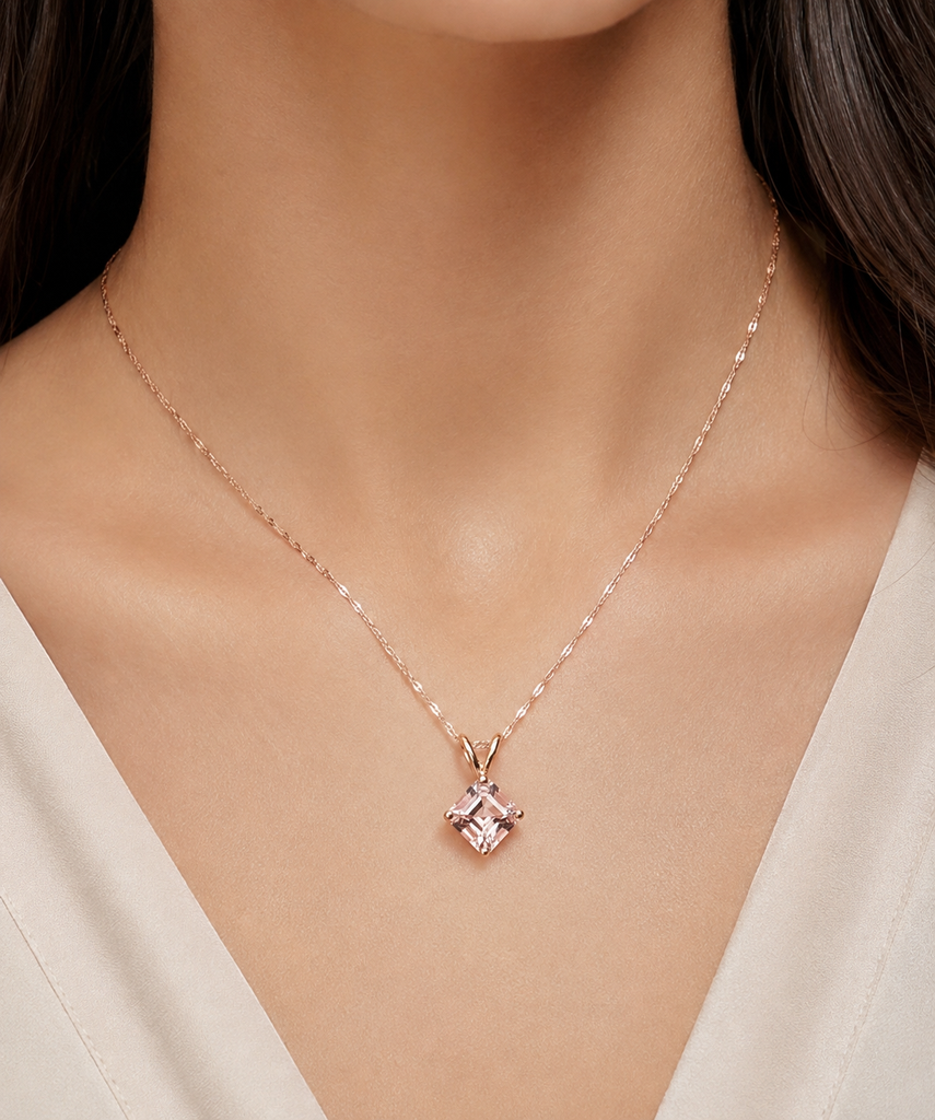 Morganite pendant worn on neckline with elegant styling featuring AAA Asscher cut morganite pendant 