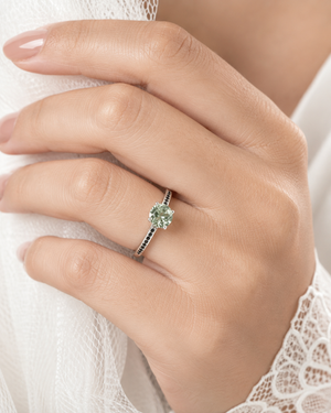 Green Amethyst Engagement Ring worn on finger with elegant bridal styling showcasing Black Diamond Engagement Ring 