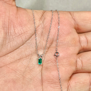 5x3mm AAA emerald cut lab created emerald solitaire pendant necklace in solid 14K white gold with Singapore chain, 4-prong secure setting, eye-clean clarity, medium-dark green May birthstone fine jewelry gift for her.