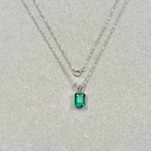 8x6mm AAA emerald cut lab created emerald solitaire pendant necklace in solid 14K white gold with Singapore chain, 4-prong secure setting, eye-clean clarity, medium-dark green May birthstone fine jewelry gift for her.