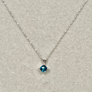 London blue topaz cushion cut solitaire pendant in 14k white gold