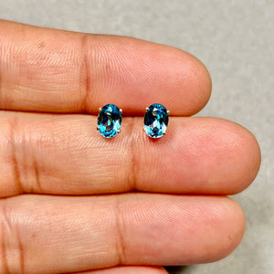 Swiss Blue Topaz Stud Earrings in 14K Yellow Gold with AAA Oval Blue Topaz