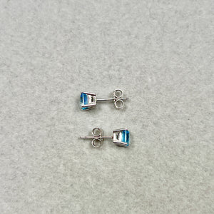 Discover Medium Blue 0.93–1.09 Ct Swiss Topaz Studs in 14K White Gold with Sculptural Sparkle and Refined Geometric Elegance