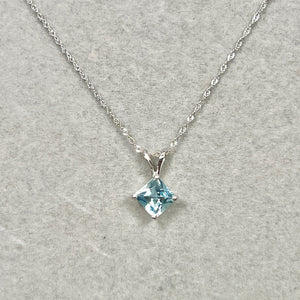 Platinum 1.05 Cts Princess Aquamarine Solitaire Pendant defined by clean prongs and balanced modern gemstone form