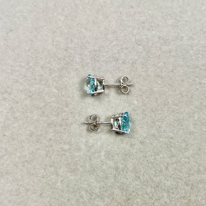 2.10–2.50 Cts 14K White Gold Aquamarine Stud Earrings with 7 mm Round Stones and Sculptural Four-Prong Clarity