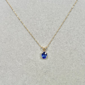 Fine-crafted 1.00–1.52 Cts 14K Yellow Gold Tanzanite Pendant with architectural prongs and rich violet oval for Women