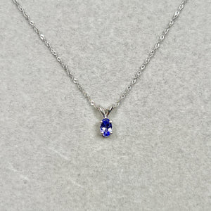 6x4mm oval tanzanite pendant in platinum solitaire necklace
