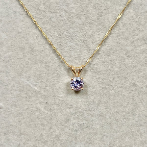 5mm round tanzanite pendant in 14k yellow gold solitaire necklace
