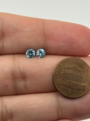 Matched natural sky-blue zircon round loose gemstone pair 4.3mm, 0.82ct total weight, brilliant fire sparkle for fine jewelry making closeout parcel.