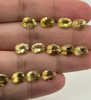 Natural yellow beryl oval loose gemstone 9x7mm, AA clarity, golden-yellow lively luster for fine jewelry making.