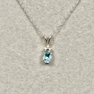 AAA Oval Aquamarine & 0.06 Cts Diamond Pendant 7x5 mm 18K White Gold – 18” Chain