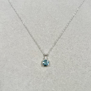 Quietly centred, 1.50–2.00 CTS platinum aquamarine pendant with Sculptural round symmetry and soft blue depth for women