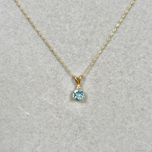 Designed for women, 0.03 Cts Diamond & 0.60–0.85 Cts Aquamarine Pendant in 14K Yellow Gold with Sculptural Prongs
