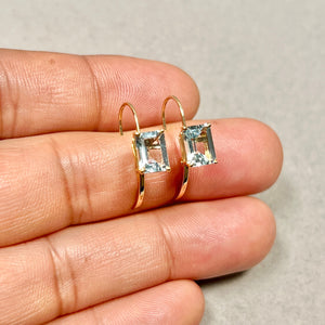 Exploring 2.80 CTS 14K Gold aquamarine studs women favour with emerald cut geometry and sculptural prong rhythm