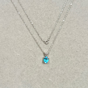 0.76–1.02 Cts AAA Oval Swiss Blue Topaz Scroll Pendant 14K White Gold – 18” Chain