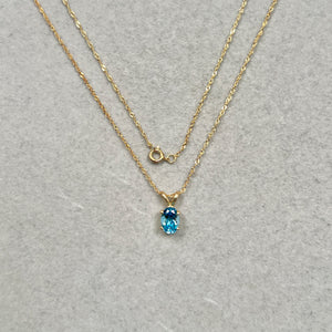 0.76–1.02 Cts AAA Oval Swiss Blue Topaz Solitaire Pendant 14K Yellow Gold – 18” Chain