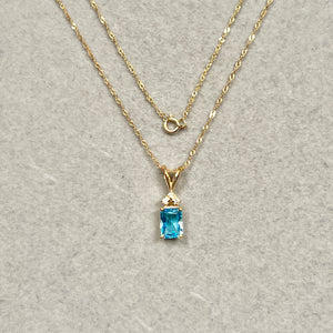 0.89 Cts AAA Swiss Blue Topaz & 0.03 Cts Diamond Pendant Emerald Cut 14K Yellow Gold – 18” Chain