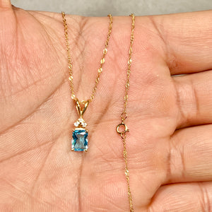 0.89 Cts AAA Swiss Blue Topaz & 0.03 Cts Diamond Pendant Emerald Cut 14K Yellow Gold – 18” Chain