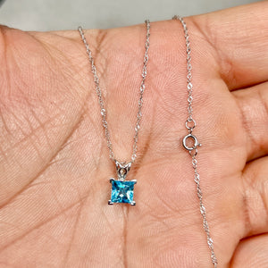 0.69 Cts AAA Princess Swiss Blue Topaz Scroll Solitaire Pendant 14K White Gold – 18” Chain