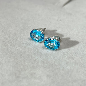 Featuring 3.85–4.97 CTS Swiss Blue Topaz, AAA Stud Earrings in 14K White Gold for women