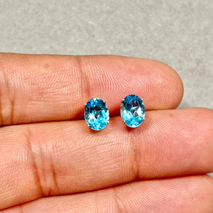 Swiss Blue Topaz Oval Stud Earrings in 14K White Gold, 2.40–2.95 Ct Modern Heirloom Design