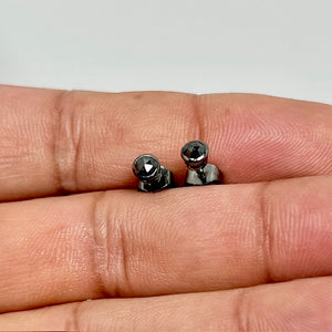 Men’s stud earring featuring a 3mm AAA round rose cut black diamond bezel set in 14K blackened white gold. Minimalist men’s diamond stud with a smooth polished finish, secure push back closure, and refined modern profile. 