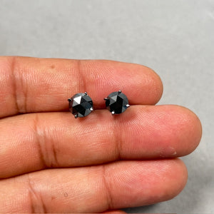 Men’s stud earring featuring a 1¾ carat AA round rose cut black diamond measuring approximately 7.00–7.66 mm, EGL USA certified and prong set in solid 14K blackened white gold. The sculptural single-stone design highlights the faceted rose cut surface and deep black tone, finished with secure push back closure for daily wear and modern masculine styling. 