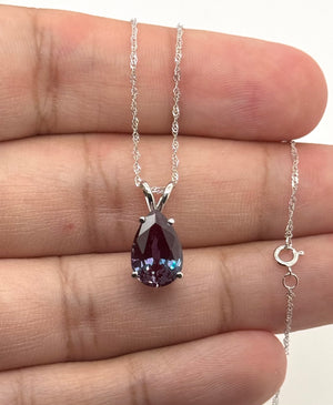 Side view of 14K white gold pendant with secure prong craftsmanship 