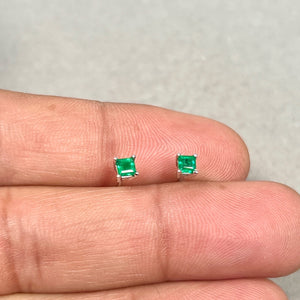 macro shot of square step cut emerald facets